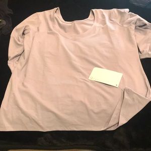 Moisture wicking workout 3/4 sleeve top.